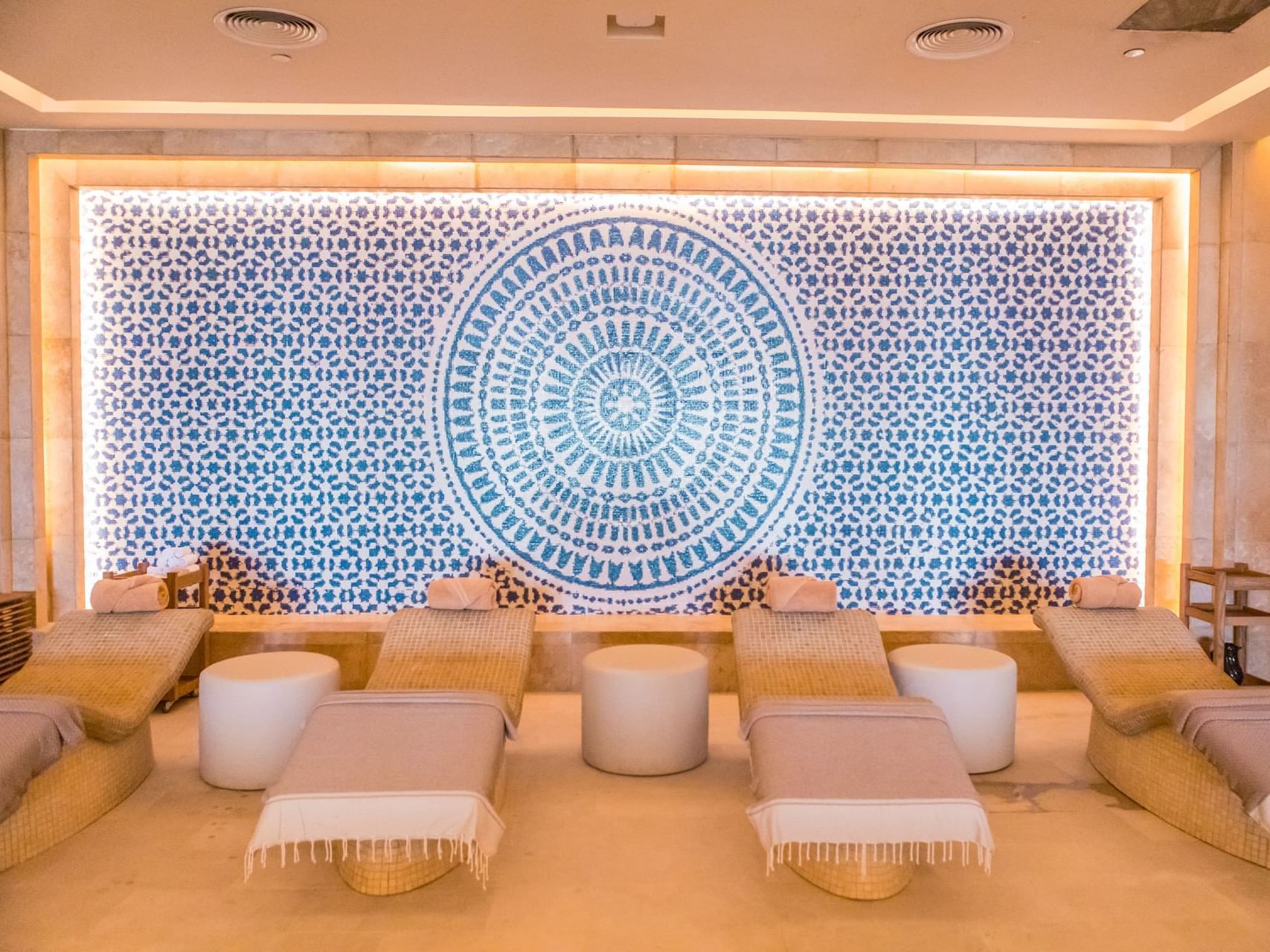 Interior of spa at haven Riviera Cancun with spa beds & wall decor
