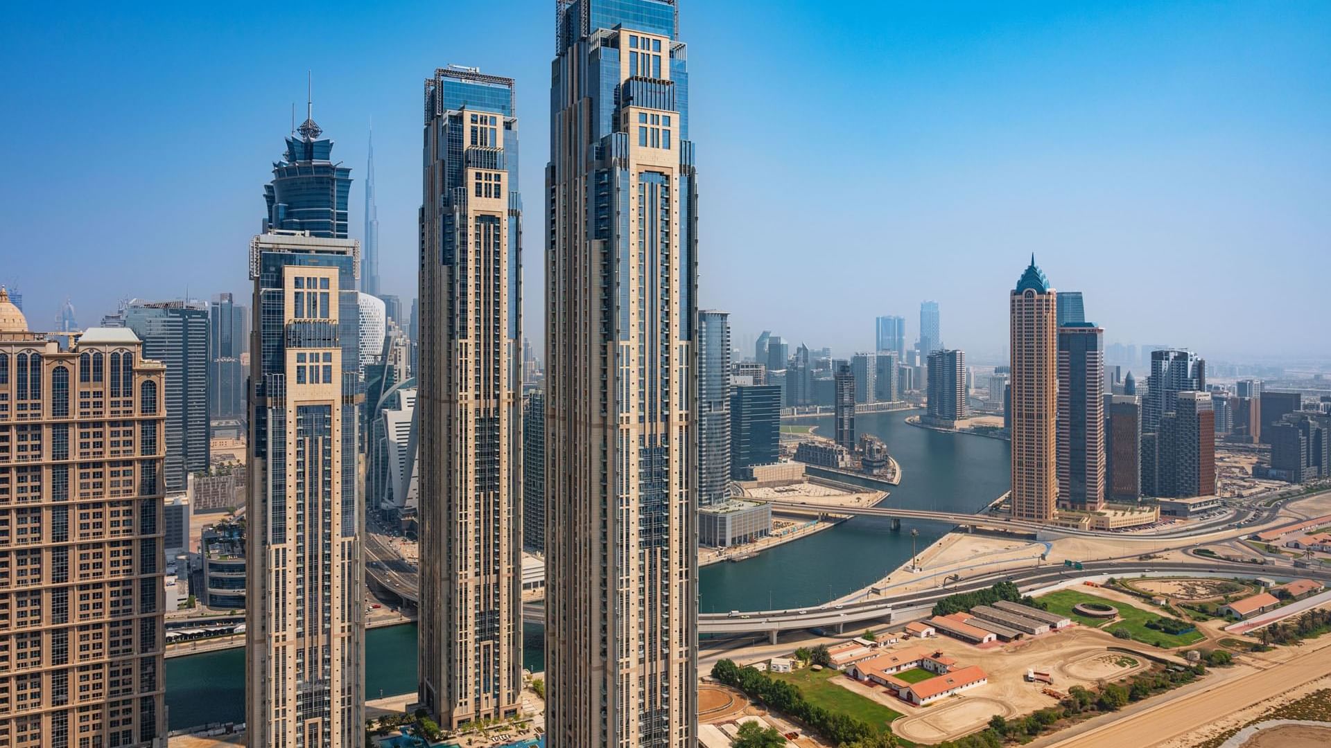 Distant view of Dubai's towering skyline near DAMAC Maison Aykon City Hotel Apartments