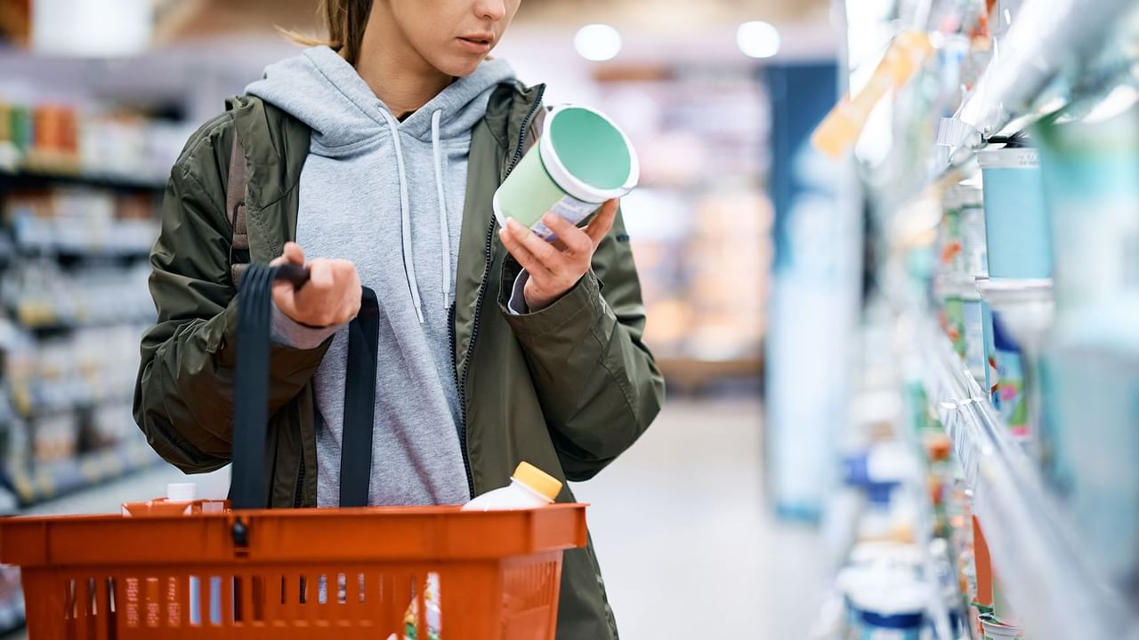 young women in a grocery store shopping