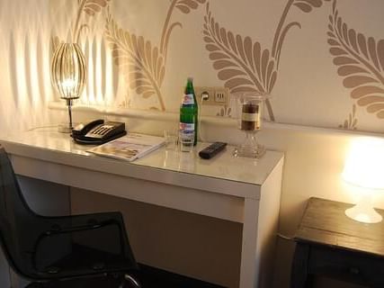 Table with stationery in a room at Rheinland Hotel Kollektion