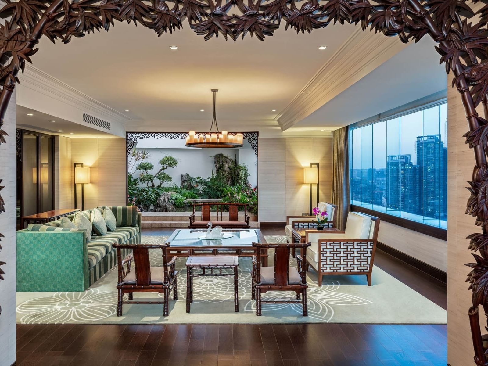 Living room area in Presidential suite at White Swan Hotel