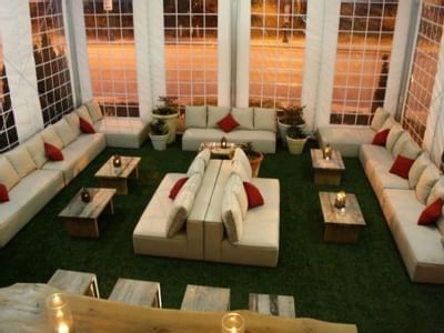 Couches in a lobby area at Artmore Hotel