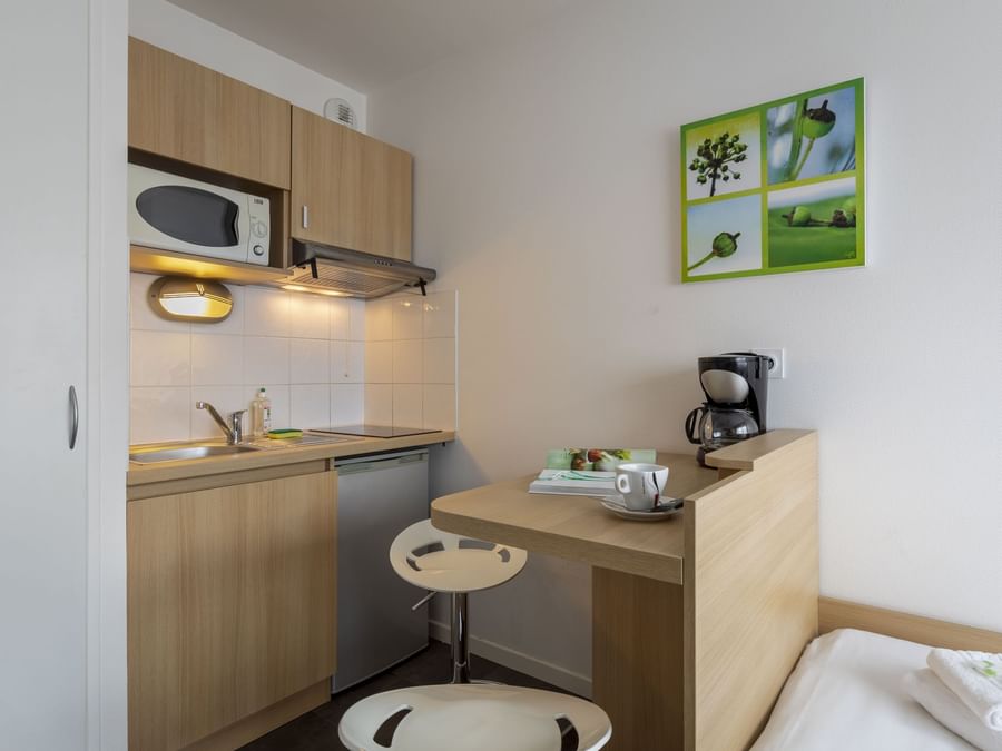 mini kitchen at kosy appart hotels troyes city and park