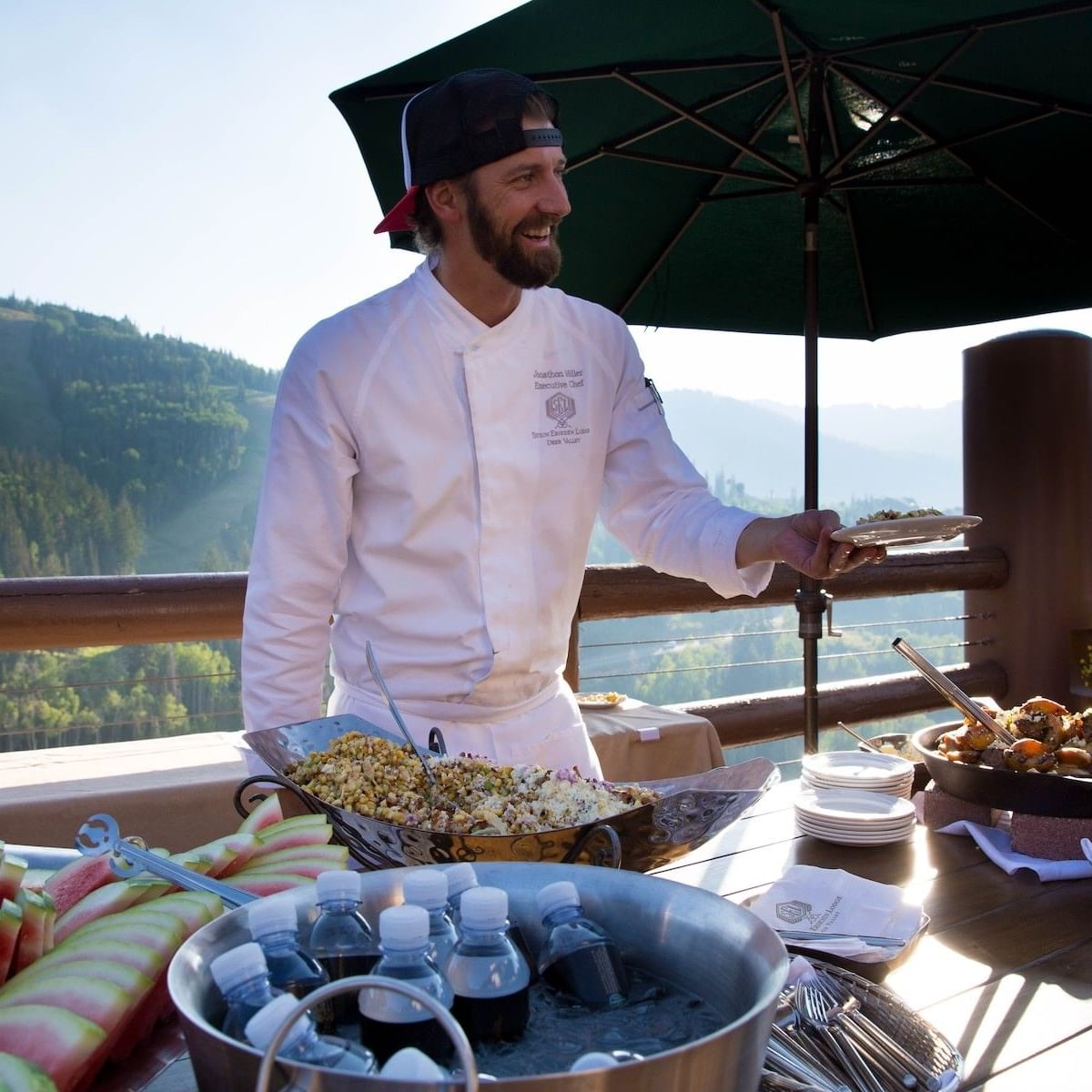Chef serving food outside