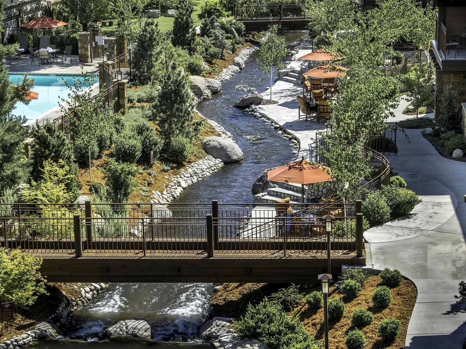a creek running beside a walkway