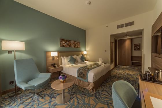 Junior Suite with a King bed at Mena Plaza Albarsha Dubai