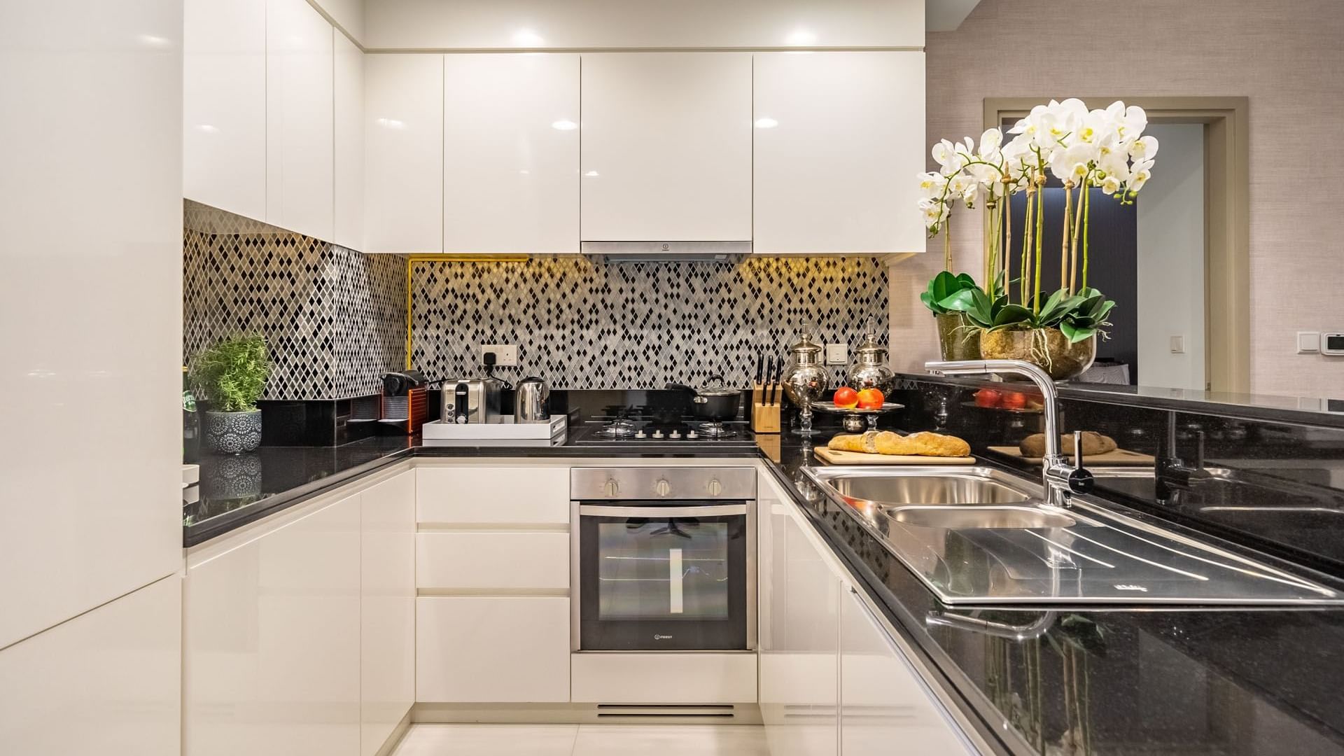 Luxury Apartment kitchen area with appliances at DAMAC Maison Aykon City Hotel Apartments