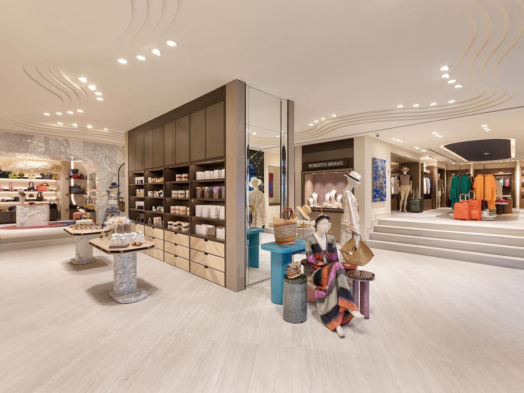 An elegant boutique atmosphere with displays and shelves at Titanic Luxury Collection Bodrum.