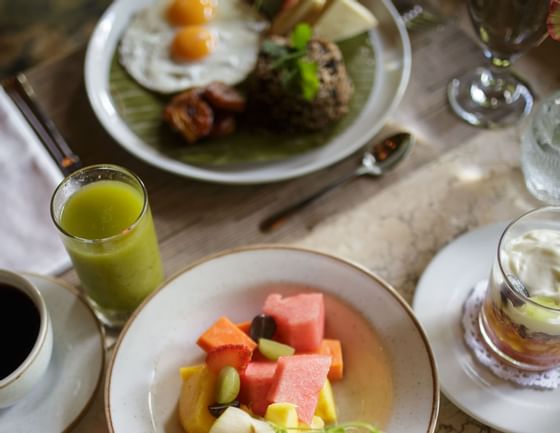 Fruit salad with juice in the restaurant at Rio Celeste