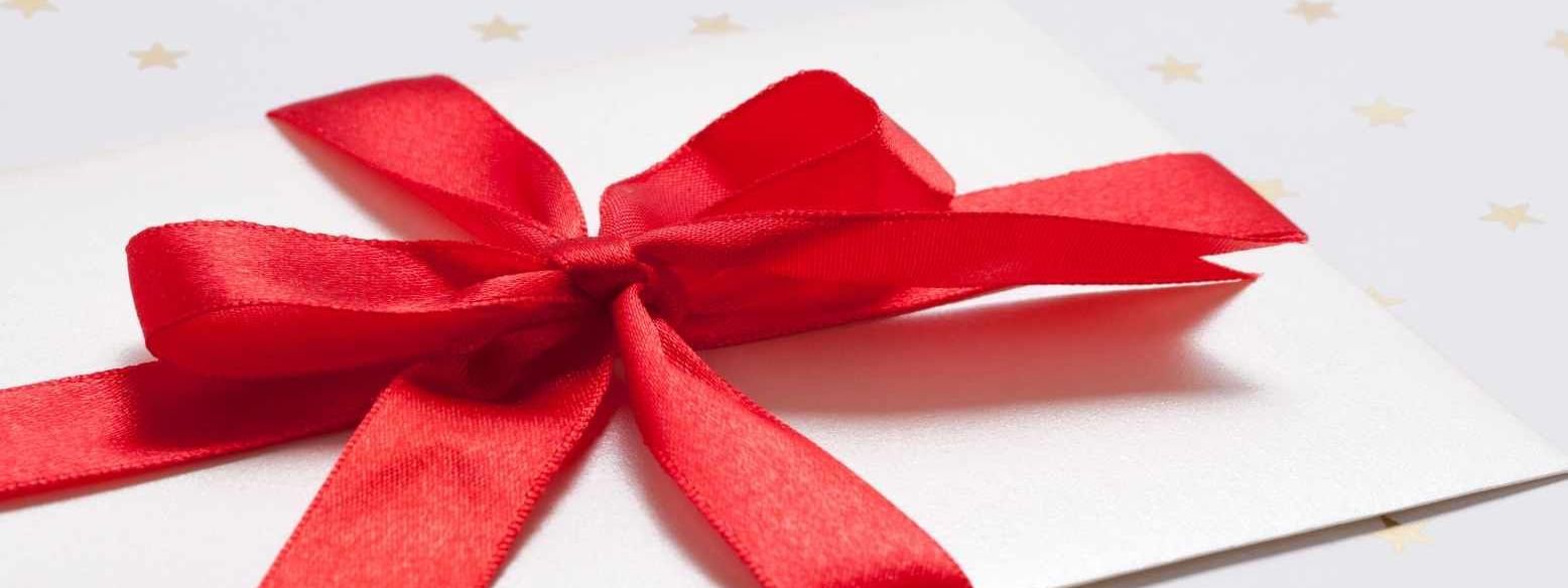 A voucher with a red ribbon at Pullman Melbourne City Centre
