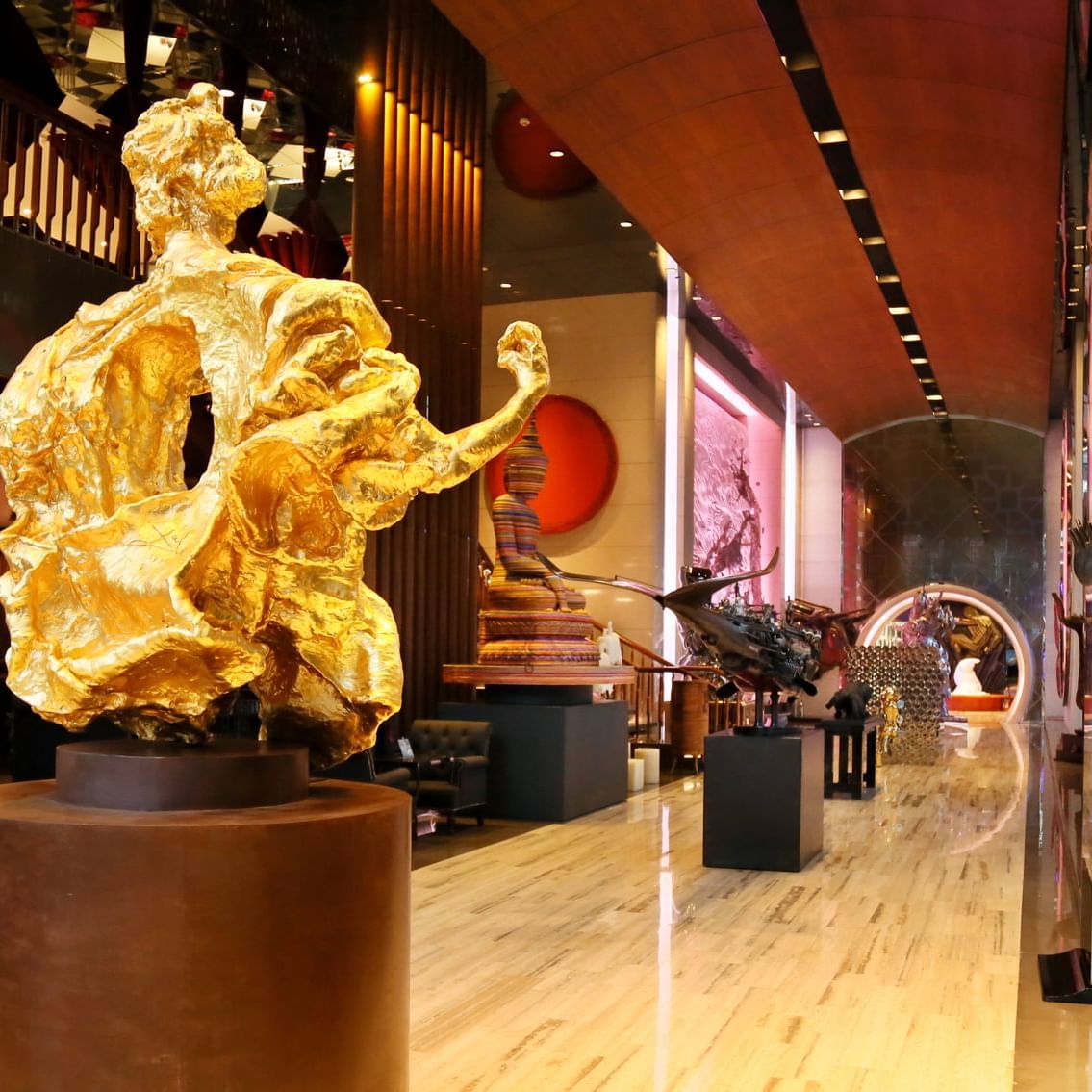 Gold plated sculpture in the hotel lobby at Hotel Éclat Beijing