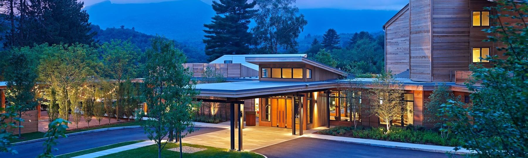 Exterior view of Topnotch Stowe Resort at dusk