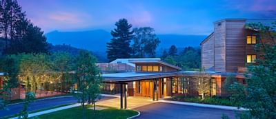 Exterior view of Topnotch Stowe Resort at dusk