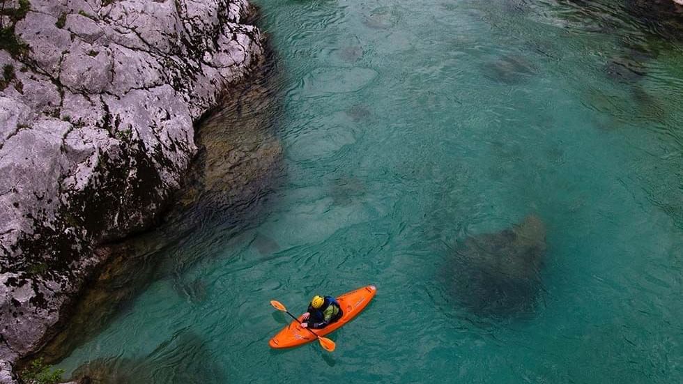 Aerial view of a person kayaking near Falkensteiner Hotels