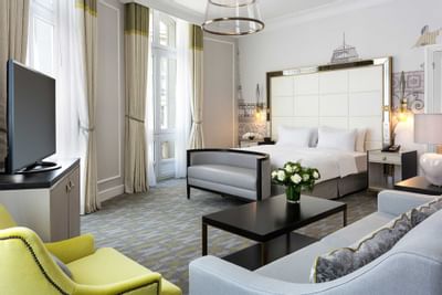 Bed & furniture in Superior Room at Hilton Paris Opera Hotel