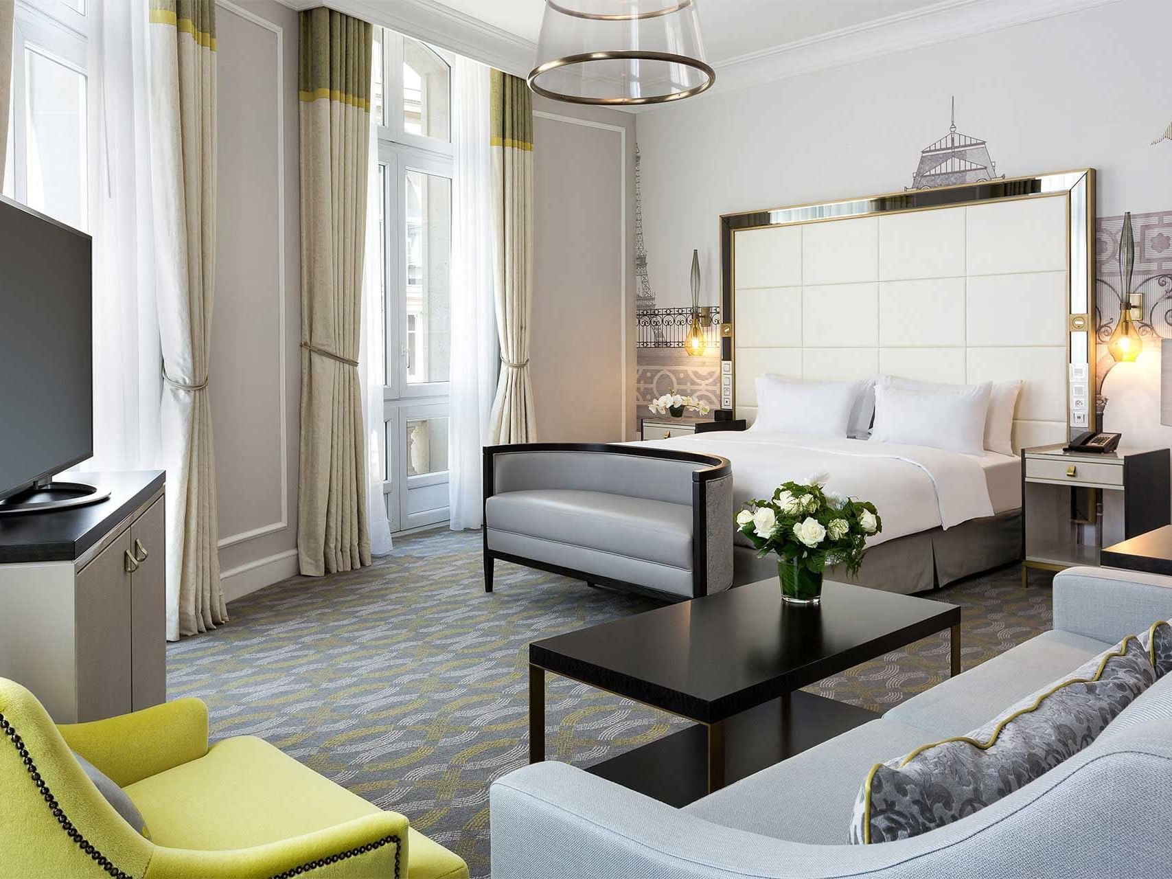 King Junior Suite Bed & furniture at Hilton Paris Opera Hotel