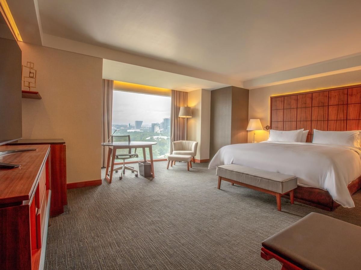 Spacious Deluxe Room with king bed at Grand Fiesta Americana