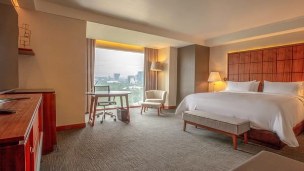 Spacious Deluxe Room with king bed at Grand Fiesta Americana