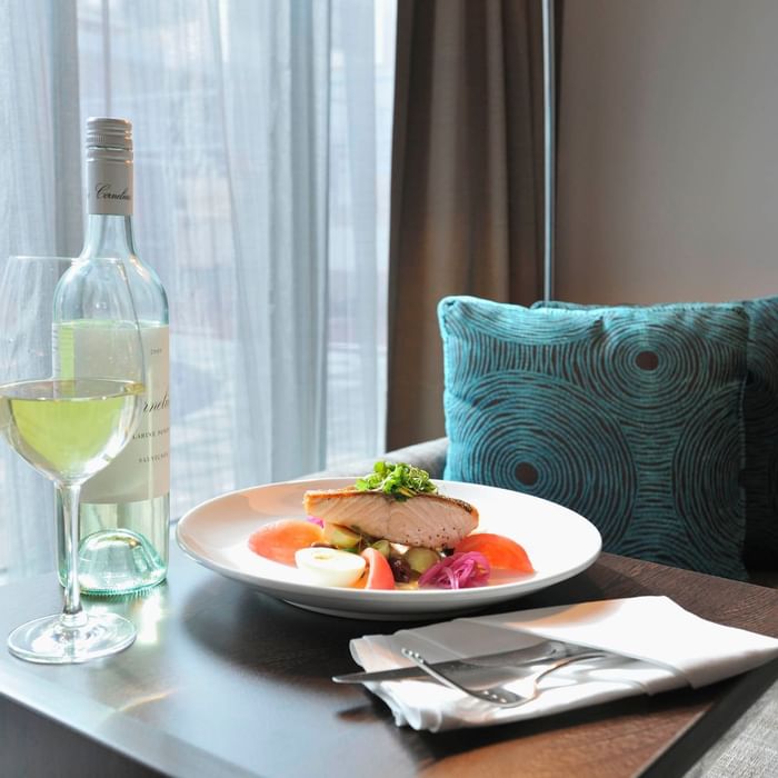 Close up on breakfast in bed served at Novotel Melbourne