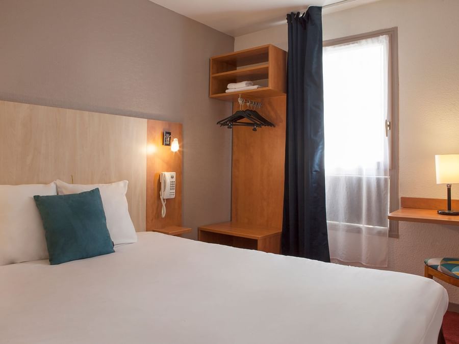 Closeup of Bedroom with pillows at Hotel Novella