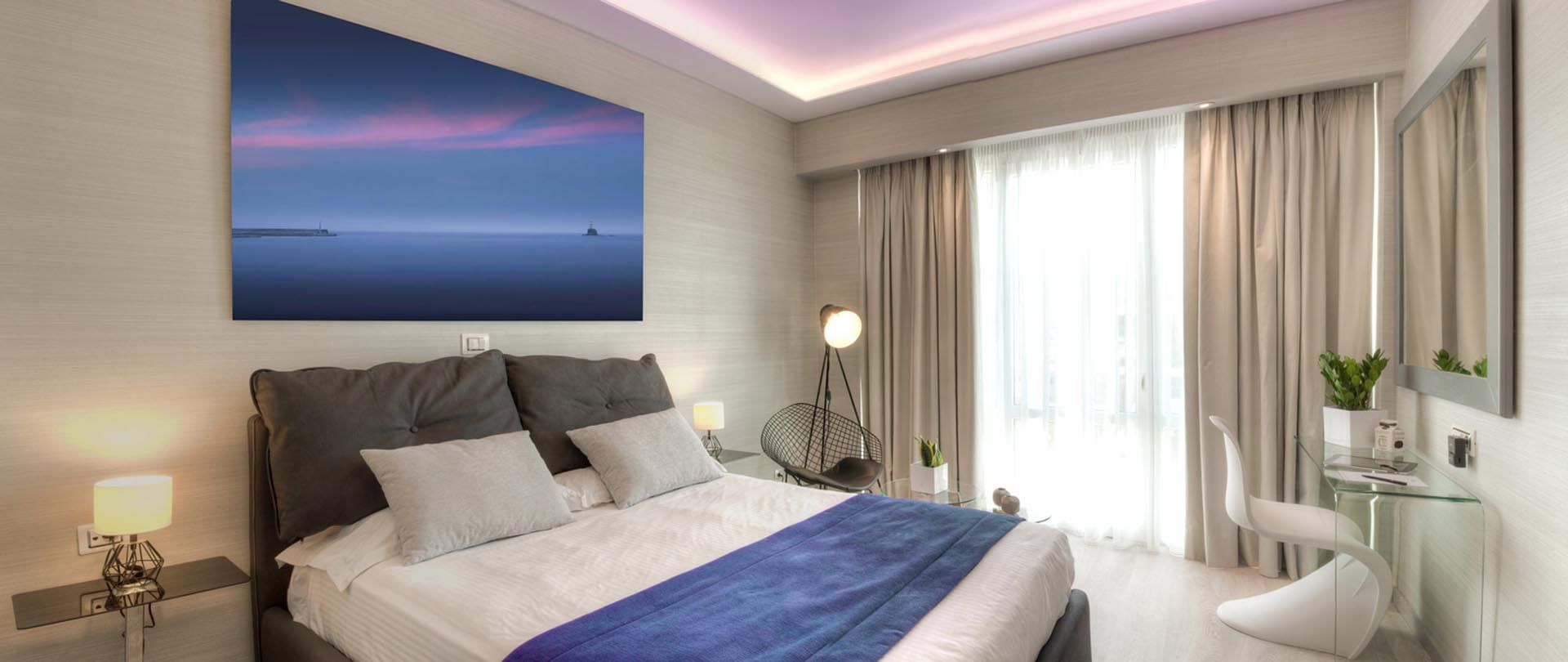 king size bed in the guest room at St. George Lycabettus