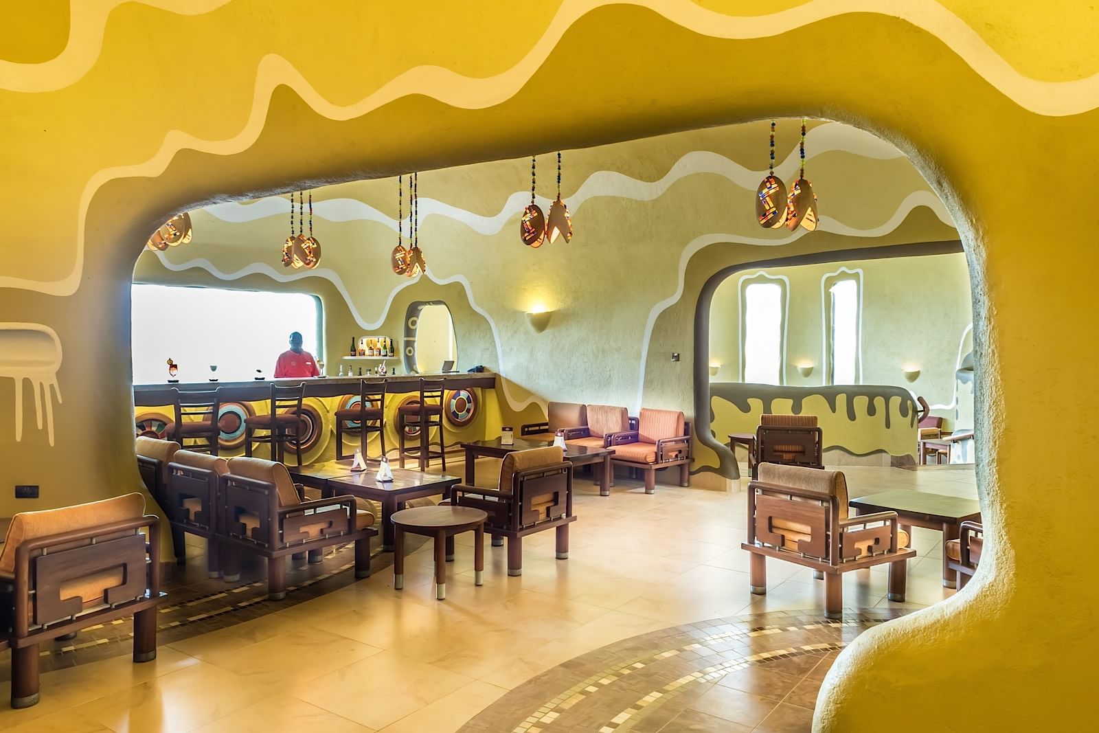 Main restaurant with a bar area at Mara Serena Safari Lodge