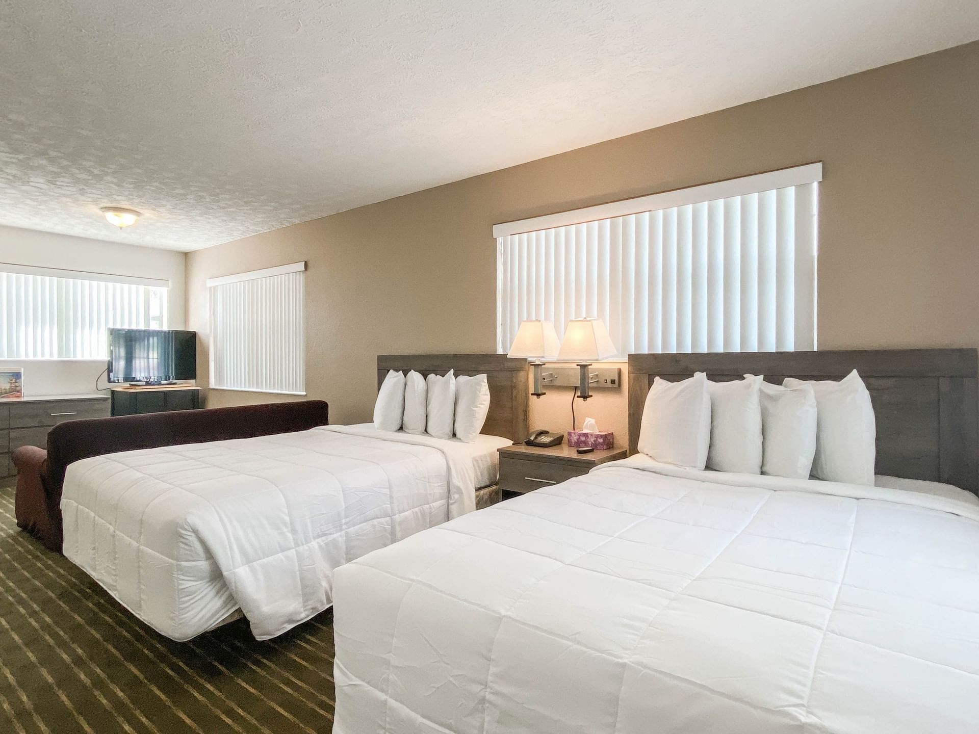 Two comfy Beds in Junior Suite at Ocean Court Beachfront Hotel