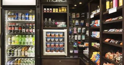 Hotel sundries shop with refrigerated drinks, ice cream, snacks, and travel essentials at Branson Hillside Hotel