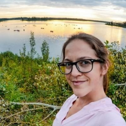 Selfie of lady beside a lake near Varscona Hotel on Whyte