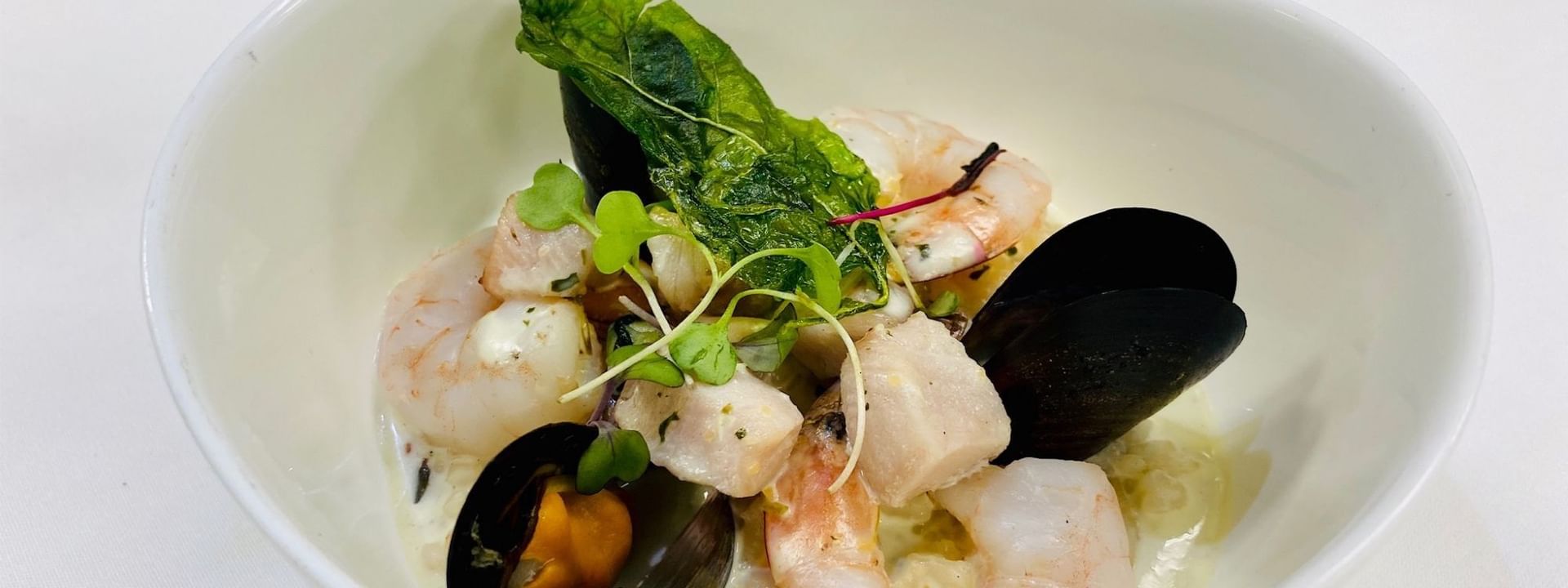 Seafood stew with mussels under a crispy leaf in Abbiocco at Warwick Paradise Island Bahamas
