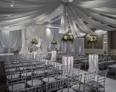 silver chairs in a decorative wedding reception