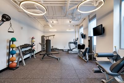 fitness center with exercise equipment