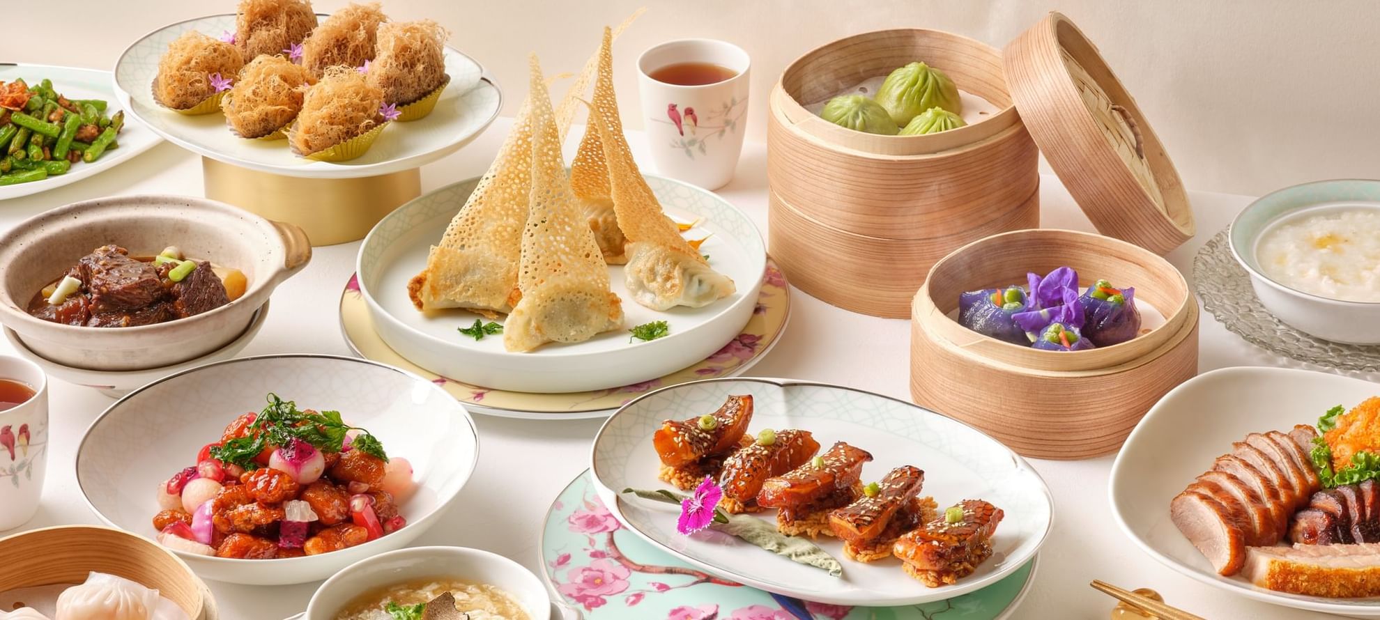 Close-up of a New Year's Celebration feast arranged on a table at The Fullerton Hotel Singapore