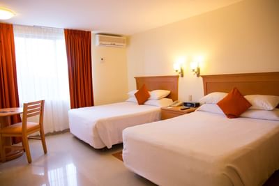 Twin beds in Superior Room at Araiza Hotel Palmira