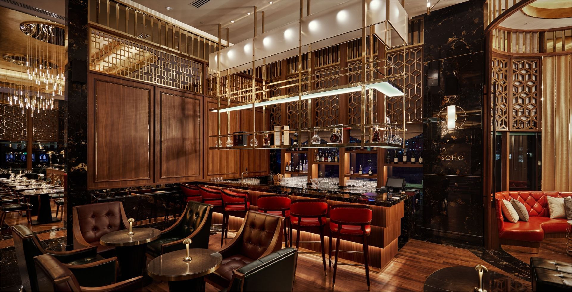 Luxurious hotel bar at Sunway Hotel Pyramid with a stylish design, comfortable seating, and a well-stocked bar