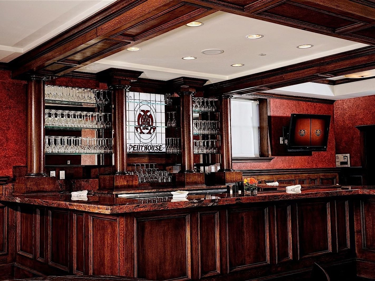 Bar area of Penthouse Rooftop Bar at The Mayo Hotel