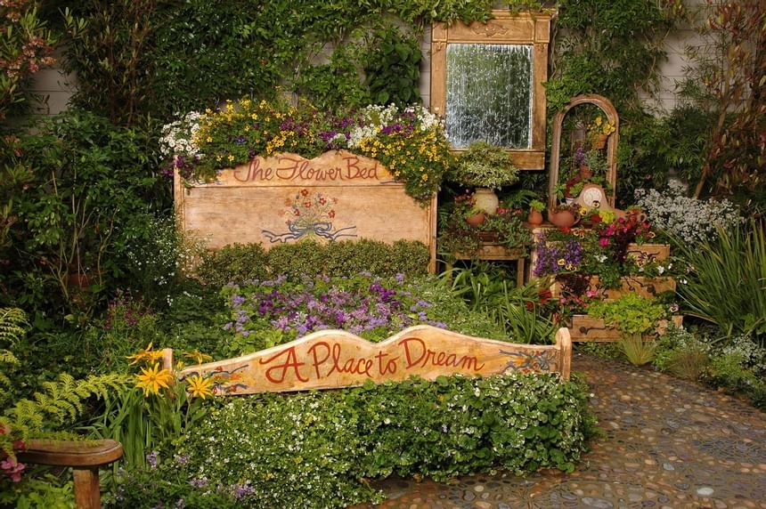 Garden with a sign that says 
