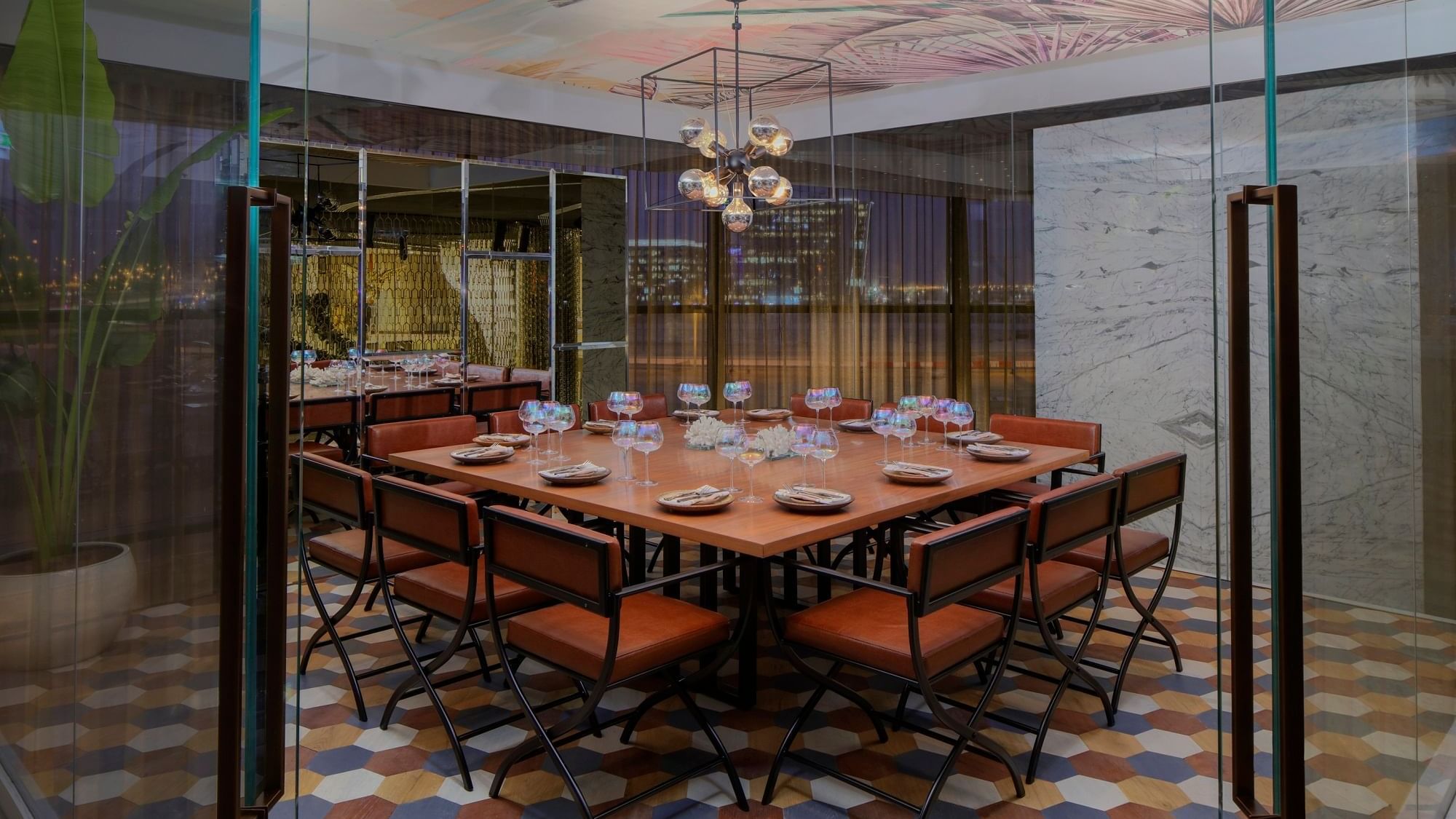 Dining table arranged with cutleries in Pacific Groove Restaurant & Lounge at Paramount Hotel Dubai