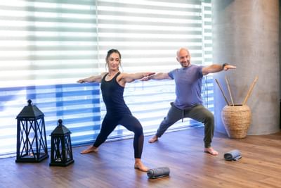 Two people doing yoga at St George Lycabettus