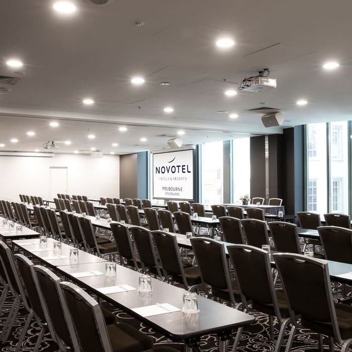 Chairs setup for a conference at Novotel Melbourne on Collins