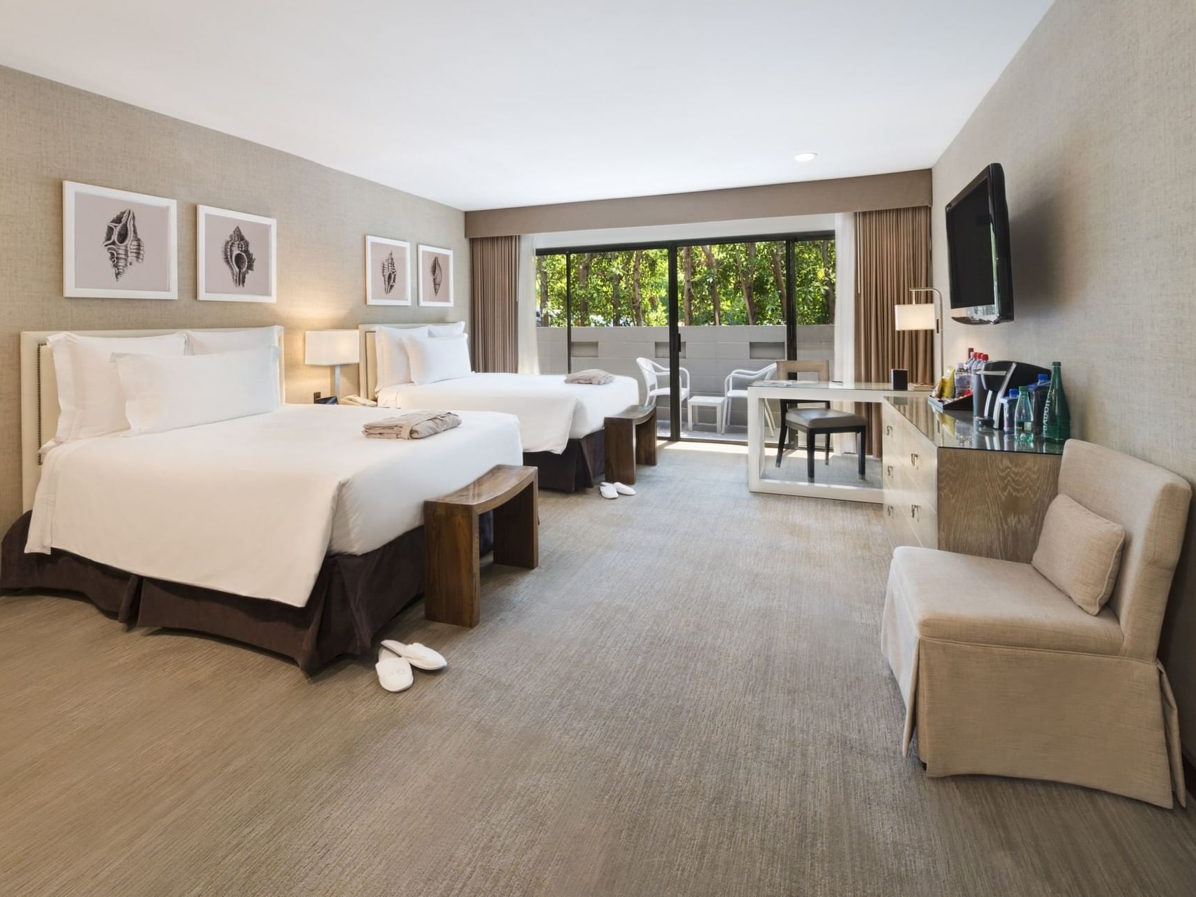 Two double beds and living area in Superior Two Double Beds at Luxe Sunset Boulevard Hotel