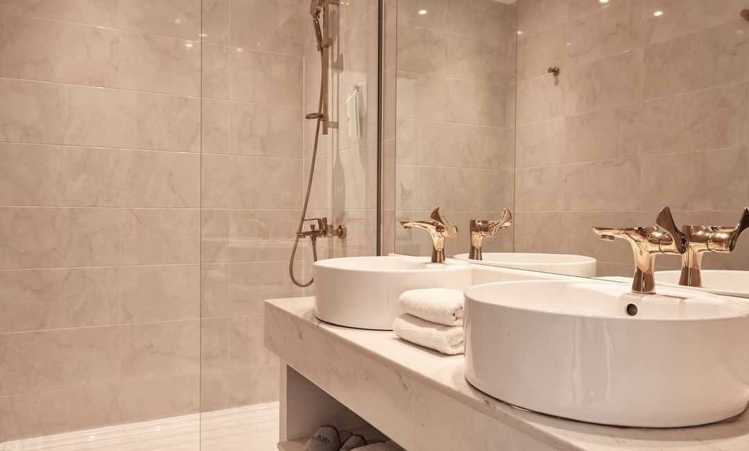 Vanity & shower in Superior pool view room at Kairaba Hotels