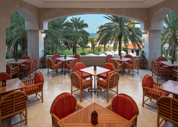Tables at the cafe on the terrace at Ajman Hotel