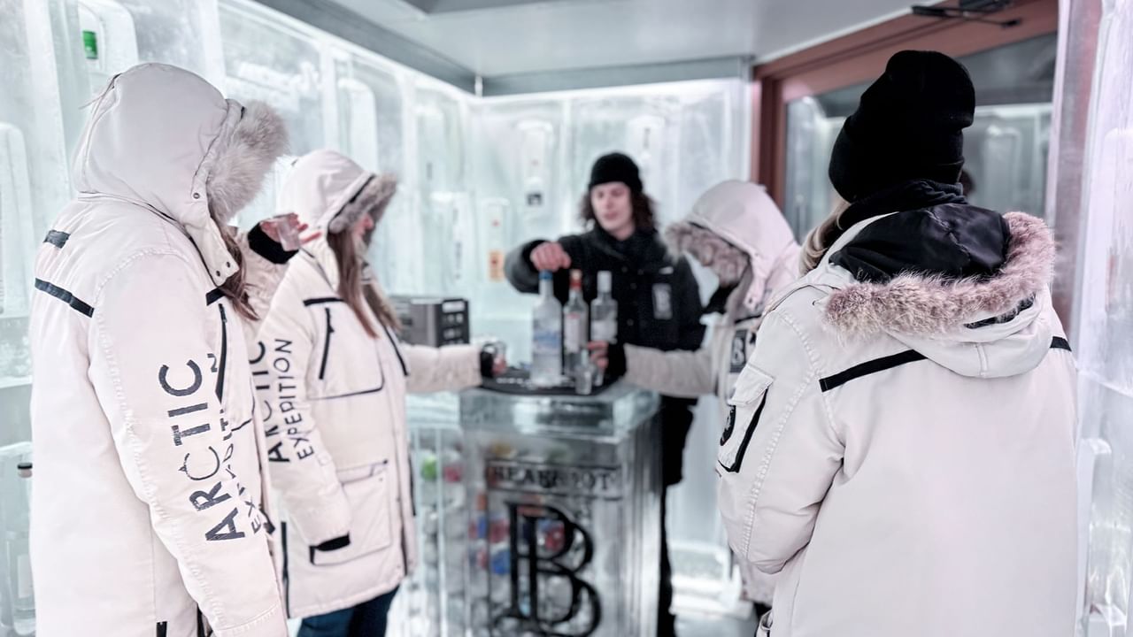 Guests enjoying vodka inside the Grey Goose Ice Room