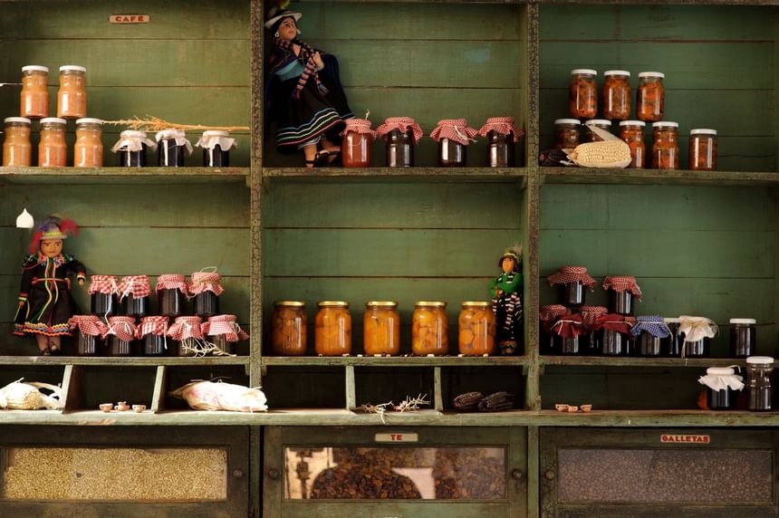 Shelf of jarred jams & pickles at NOI Casa Atacama Hotel