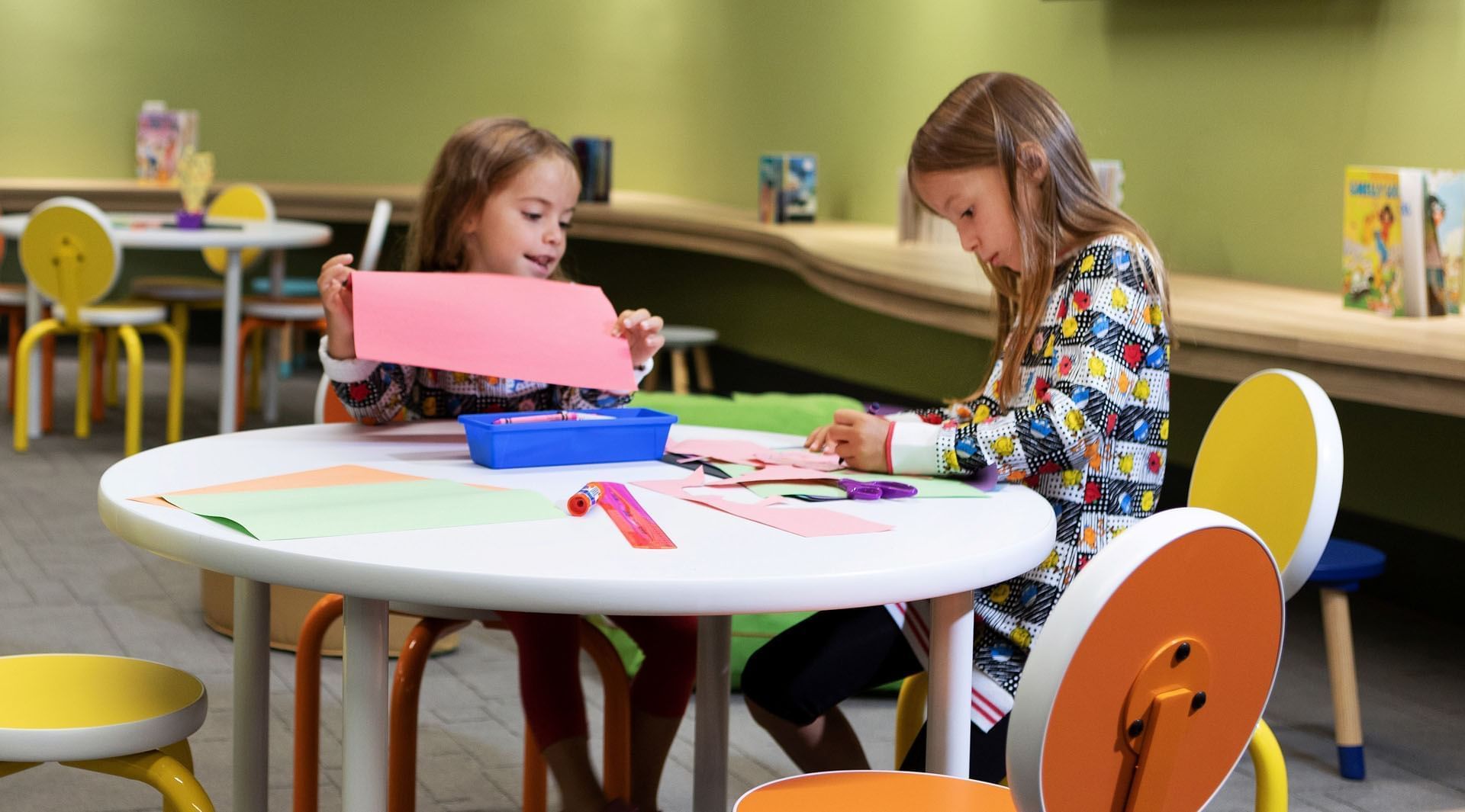 Two children engaged in arts and crafts at Kids Play Centre in Hotel X Toronto