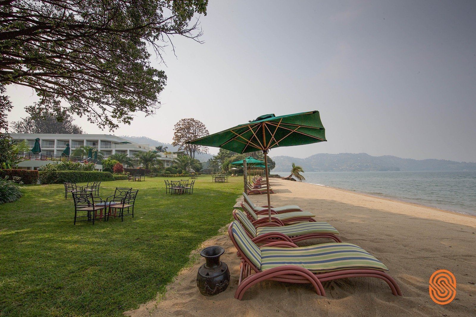 Sunbeds near the beach at Lake Kivu Serena Hotel