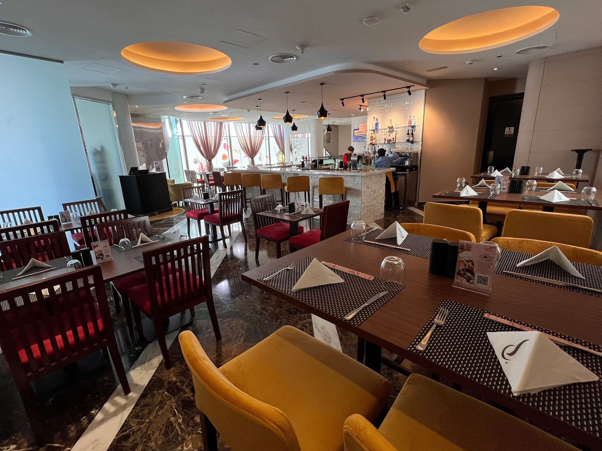 Sushi Central and Poki Bar dining area at City Seasons Towers