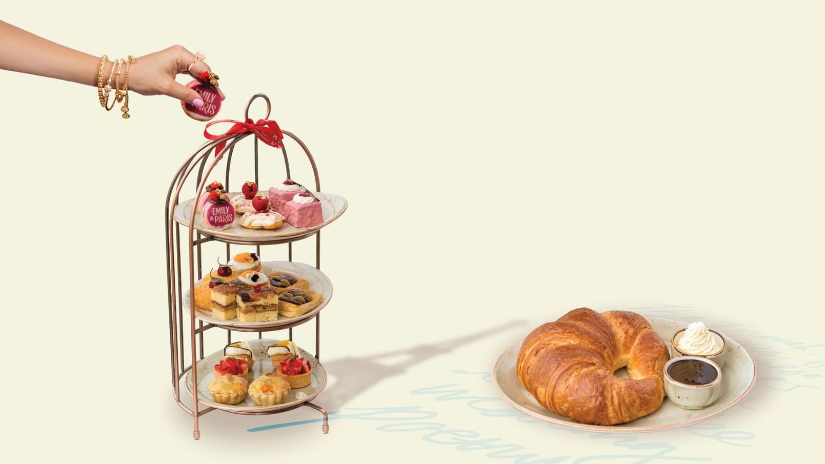 Decadent pastries and a large croissant with a chocolate dip at Paramount Hotel Midtown, a classic breakfast display