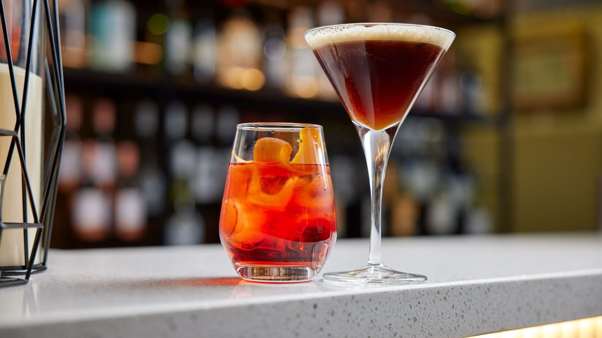 Pair of cocktails on a bar